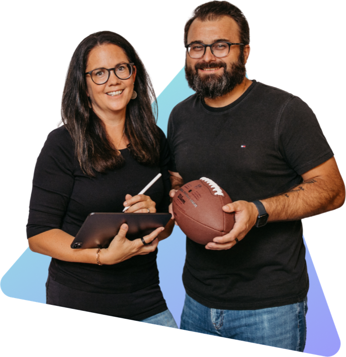 Romana and Florian Hieß, she holding a tablet, he holding a football